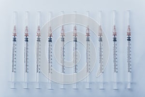 Medicine, Injection, vaccine and disposable syringe isolated, drug concept. Sterile vial medical. Macro close up on