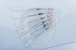 Medicine, Injection, vaccine and disposable syringe isolated, drug concept. Sterile vial medical. Macro close up on