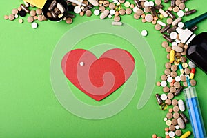Medicine and love concept. Set of colorful pills and heart