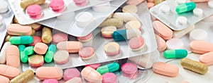 Medicine, medication. Colorful pills and capsules background, banner