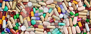 Medicine, medication. Colorful pills and capsules background, banner