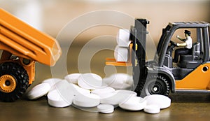 Medicine pills or capsules on wood background.Drug prescription for treatment medication.