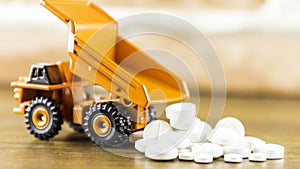 Medicine pills or capsules on wood background.Drug prescription for treatment medication.Pharmaceutical medicament.