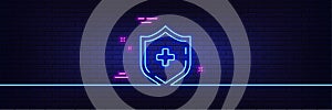 Medicine shield line icon. Medical protection sign. Neon light glow effect. Vector
