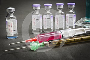 Medicine in vials and syringe