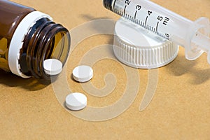 Medicines in a bottle with Syringe, medical injection