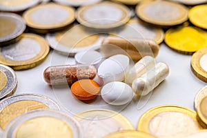 Medicines with coins around them