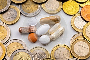 Medicines with coins around them