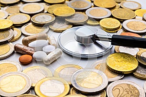 Medicines with coins around them