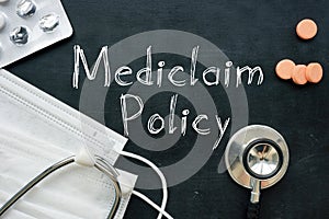 Mediclaim policy is shown on the business photo using the text