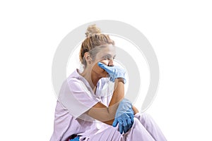 Medico girl defeated after a long day at the hospital. White background