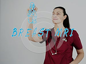 Medico writing BREAST MRI with marker