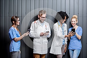 Medics with phones indoors