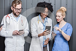 Medics with phones indoors