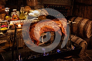 Medieval ancient kitchen tabe with typical food in royal castle