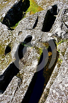 Medieval anthropomorphic tombs dug in stone. Sarmiento Castle, Ribadavia, Spain.