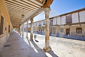 Medieval arcaded street in Ampudia old village photo