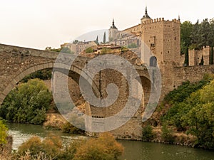 Medieval arch bridge on the Tagus River in Toledo City, Spain