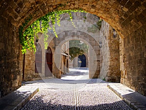 Medieval arched street photo