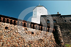 Medieval architecture. Ancient stone wall, fortress and tower in Vyborg, Russia, side view