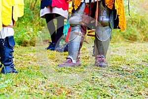 Medieval armor shoes on meadon. Detail shoes.