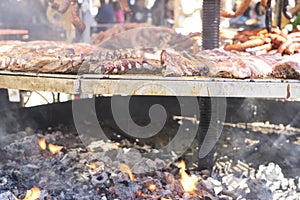 medieval barbecue with sausages, octopus, meat, ribs and all kin