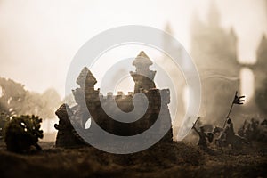 Medieval battle scene with cavalry and infantry. Silhouettes of figures as separate objects, fight between warriors on sunset