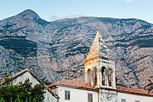 Medieval Bell Tower and Biokovo Mountains in the Background