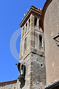 Medieval bell tower with statue