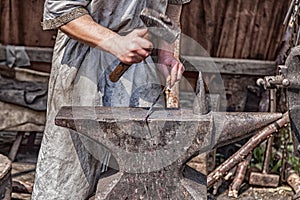 Medieval blacksmith at work