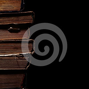 Medieval books isolated on the black background