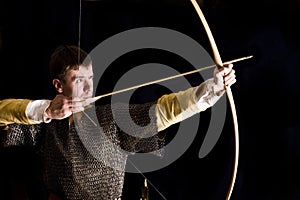 Medieval bowman. Studio shot