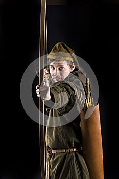 Medieval bowman. Studio shot photo