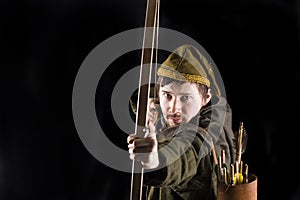 Medieval bowman. Studio shot photo