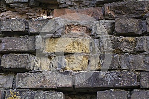 Medieval brickwork. Brick destroyed by time