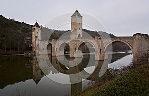Medieval bridge across the river lot