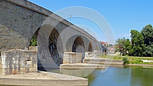 Medieval bridge over the Danube at Regensburg photo