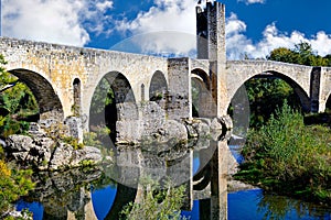 Medieval bridge over the Fluvia river in the village of Besalu, Girona, Catalonia, Spain