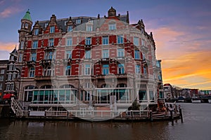 Medieval building along the river Amstel in Amsterdam Netherlands