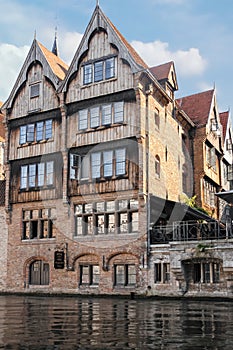 Medieval buildings in Dijver canal. Bruges. Belgium