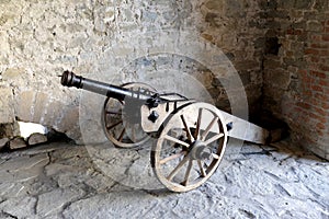 Medieval cannon in a historic fortress in Western Ukraine, Khotyn photo