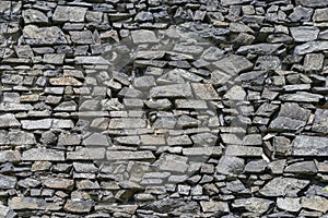 Medieval castle back basalt whinstone stone wall background