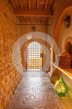 Medieval castle with beautiful sun light in Tuscany, Italy.