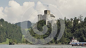 Medieval castle on hill above lake