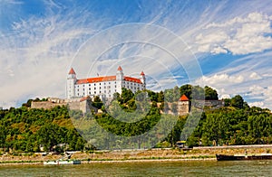 Medieval castle on the hill against the sky