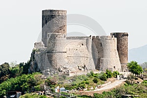 Medieval castle on a hill photo