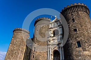 Medieval castle Maschio Angioino in a summer day in Naples