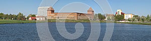Medieval castle of Prince Gedemin in the city panorama. Lida, Belarus