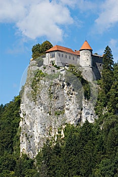 Medieval castle on rock top at lake Bled in Slovenia