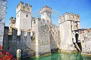 Medieval castle Scaliger in old town Sirmione on lake Lago di Ga